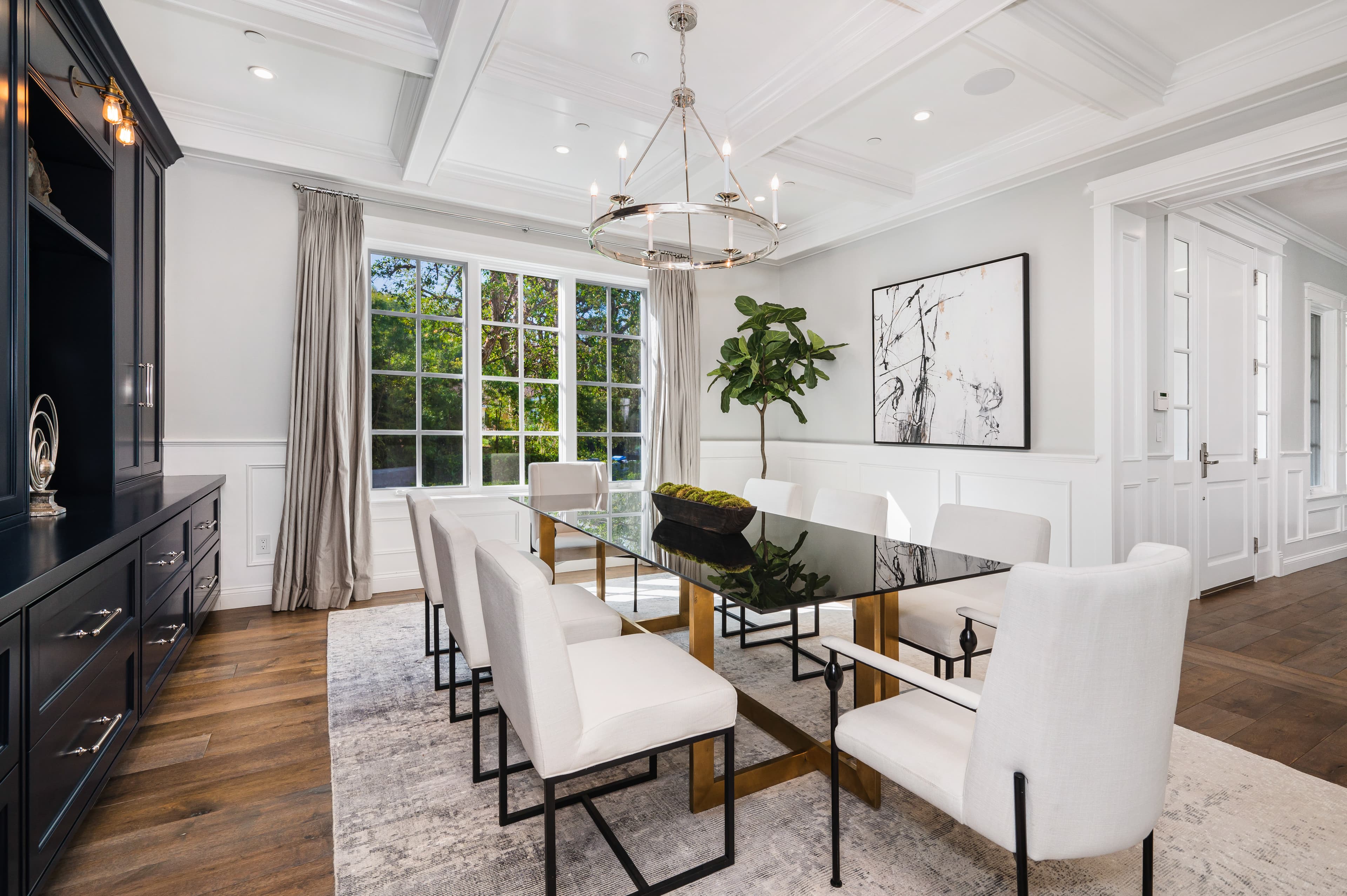 Formal dining room with wainscoting and styled table setting