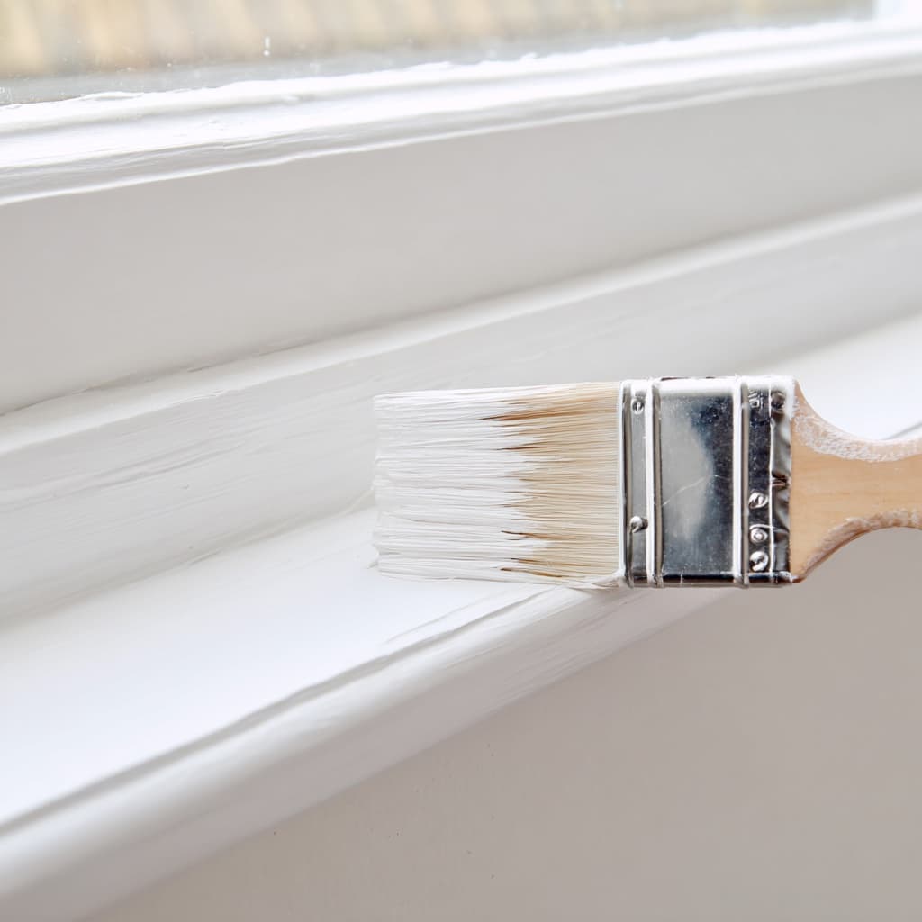 Painting trim during a pre-sale repair managed by Styling Lab